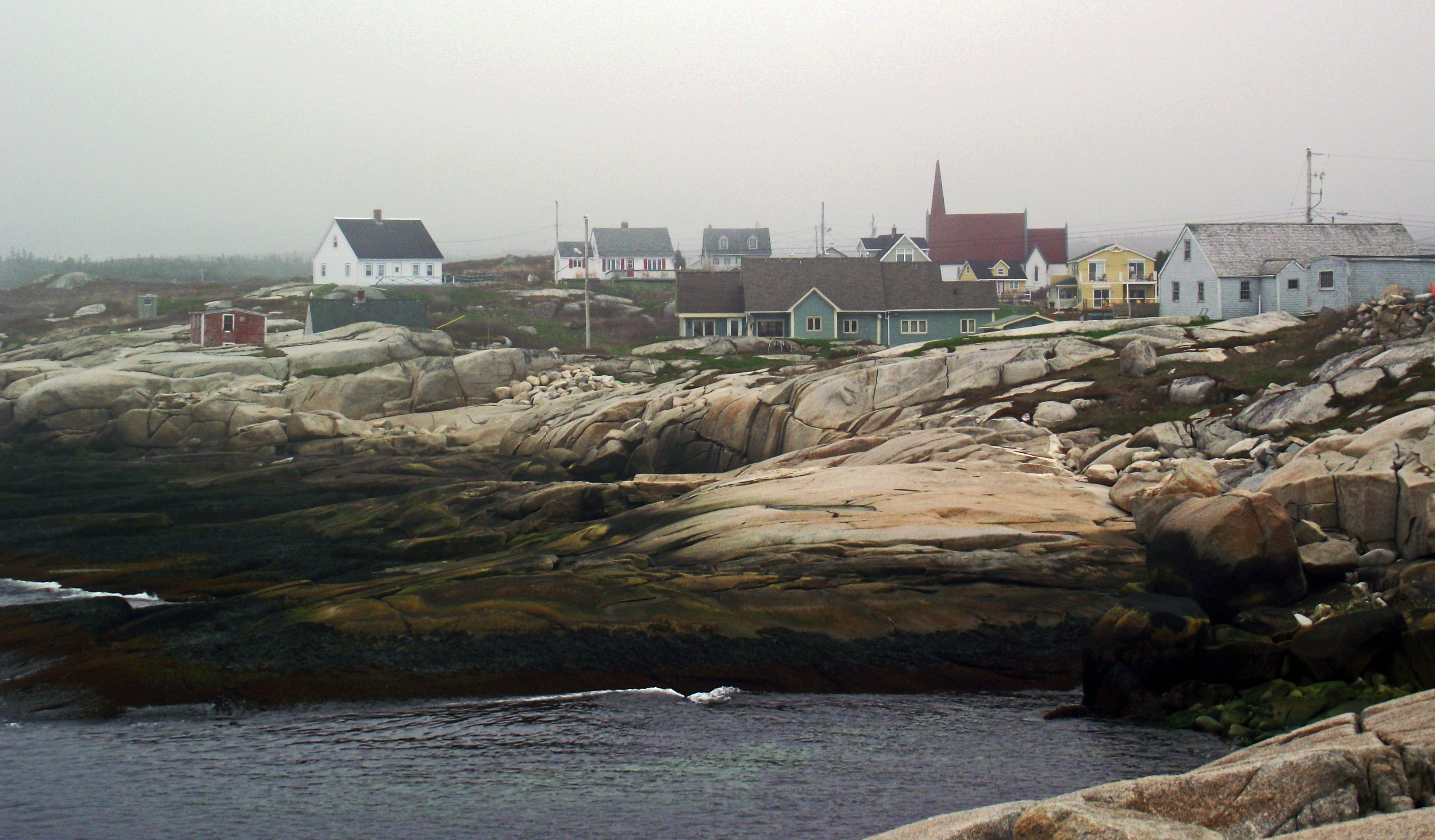 Building along the rocky land at Peggy's Cove in Nova Scotia